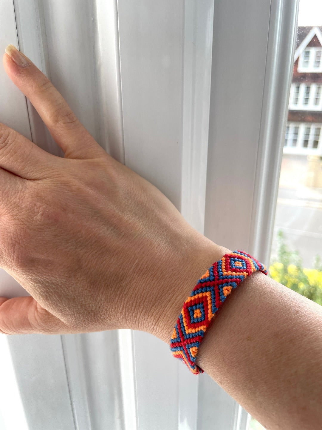 Red, Blue and Orange Handmade Friendship Bracelet